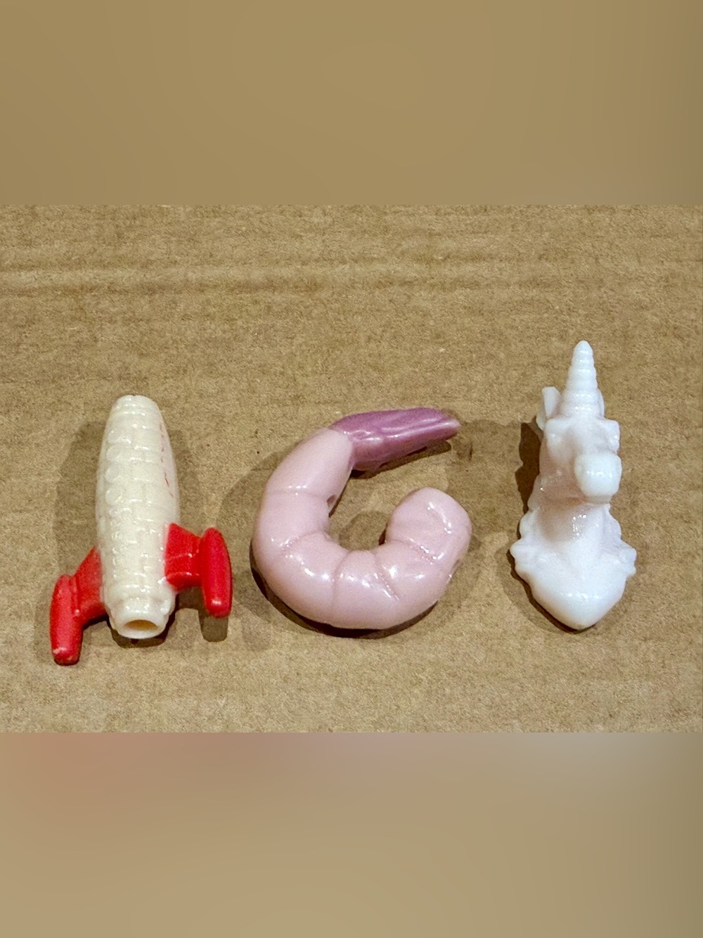 3 beads from CJ Hendry Pastel - light pink unicorn, purple shrimp, rocket ship